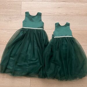 Sister emerald green dresses size 5 and 7.